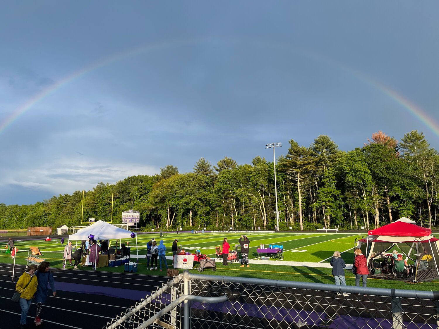 A rainbow encircled the Norton High School track shortly after the end of a two-hour thunderstorm that delayed the Relay For Life.